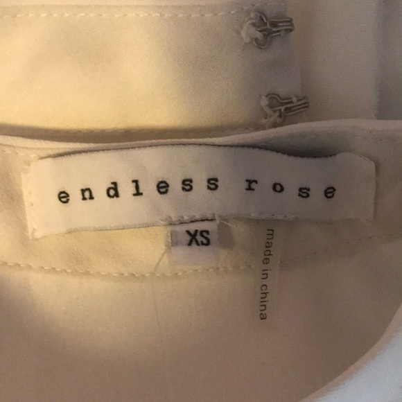 Endless rose black, white, and beige/nude dress. - Picture 4 of 6